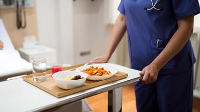 Waiter serving in motion on duty in restaurant