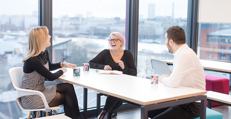 Shot of a group of young business professionals having a meeting