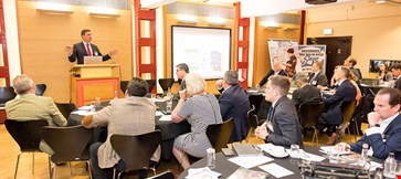 Businessman giving a lecture to a group 