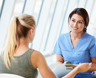 nurse-meeting-teenage-girl-modern-hospital