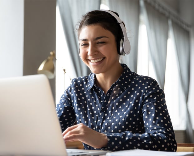 A lady discussing on laptop