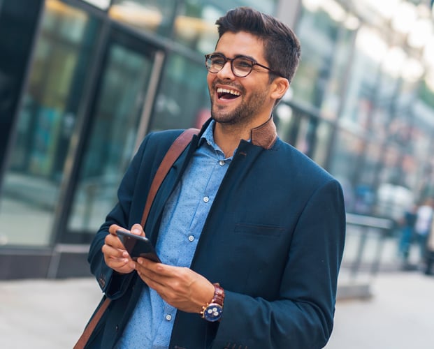 A laughing man on the street