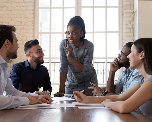 female-black-executive-leader-talking-happy