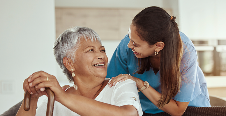 Care taker and woman smiling