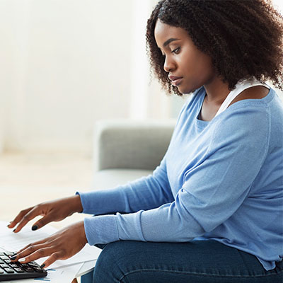 African woman working on the laptop