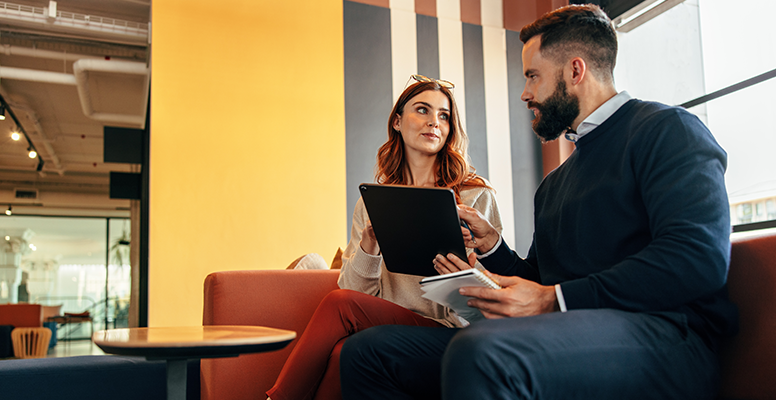 two-young-entrepreneurs-having-important-discussion